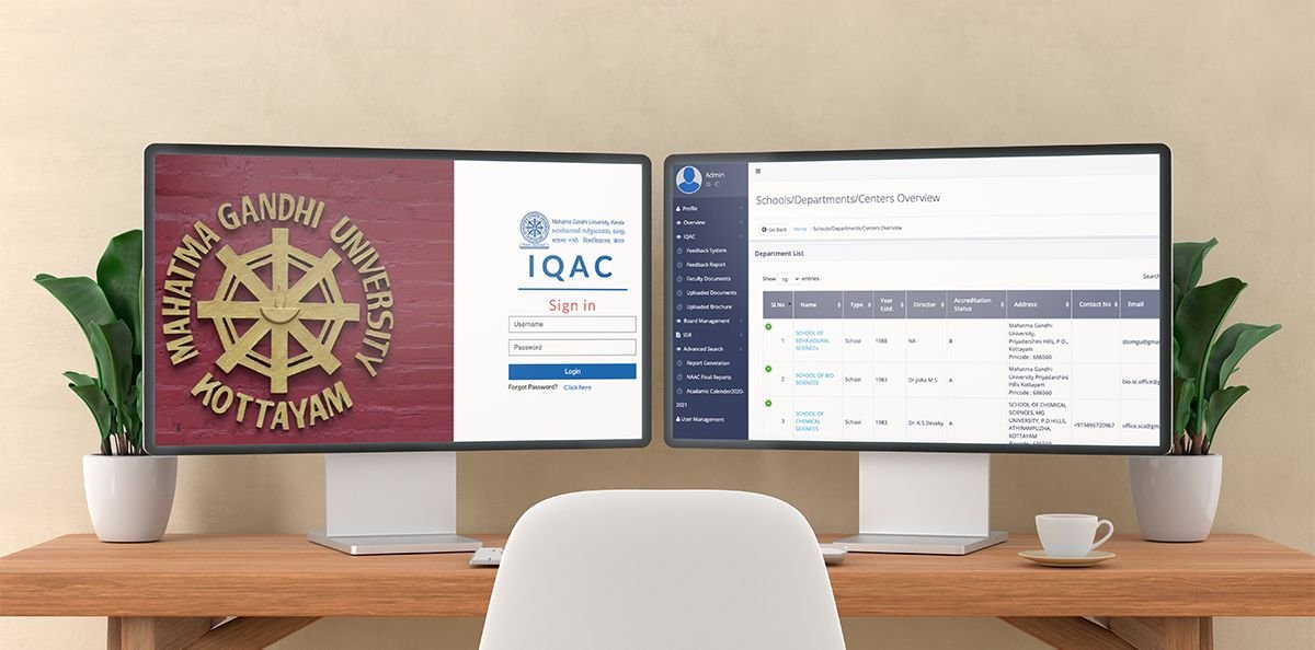 The MG University accreditation application on two monitors